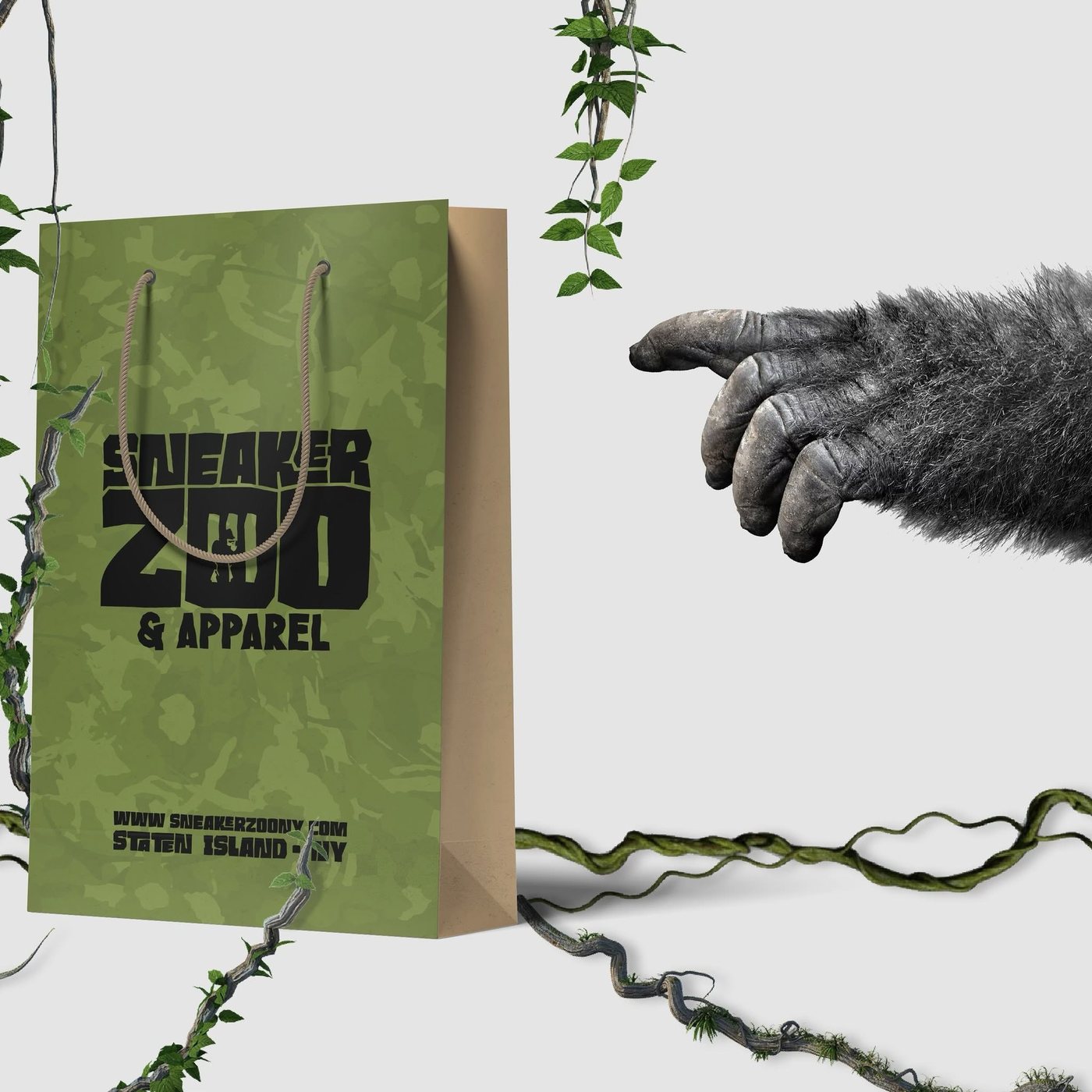 Sneaker Zoo and Apparel shopping bag in green camo with the gorilla wordmark, Staten Island NY